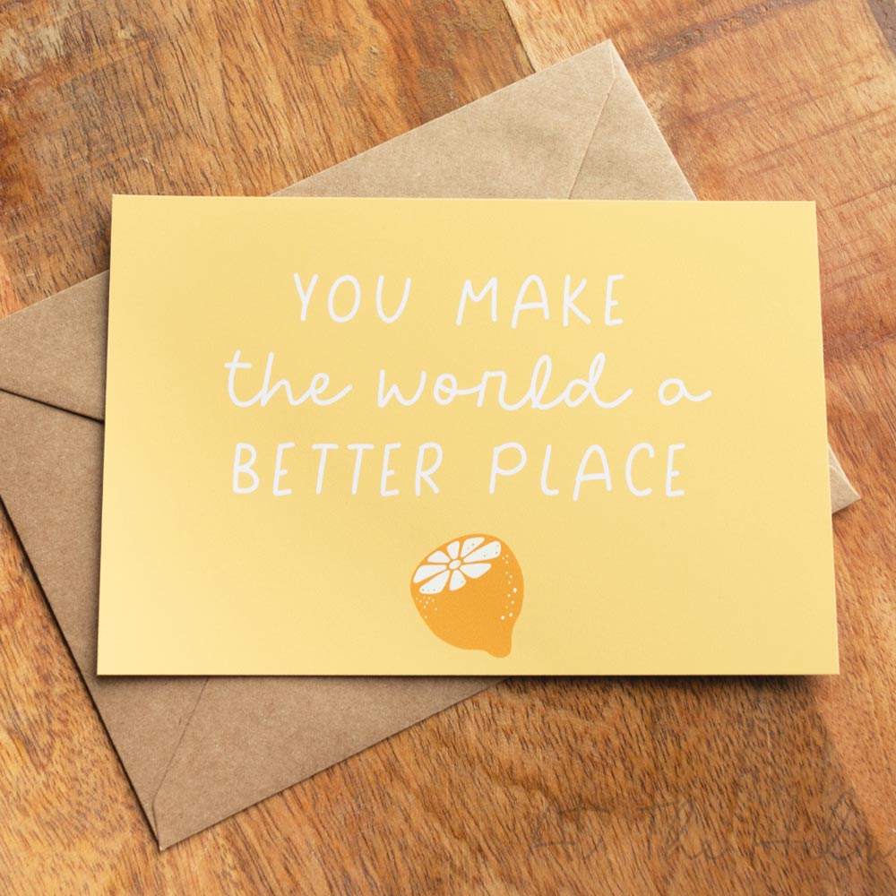 Yellow positivity note card that reads "You make the world a better place" features a lemon fruit design - At The helm NZ