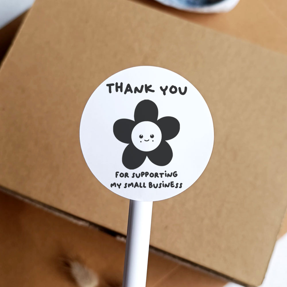 Cute flower packaging stickers in white that reads "thank you for supporting my small business" - At The Helm NZ