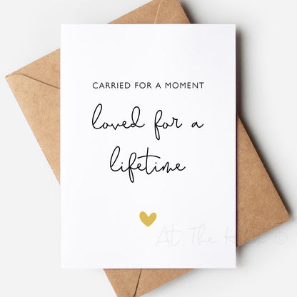 White card with black text that reads "carried for a moment, loved for a lifetime" - miscarriage support card - At The Helm 