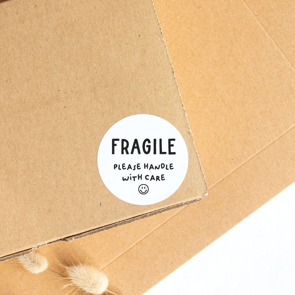 Fragile handle with care packaging sticker white - At The Helm NZ