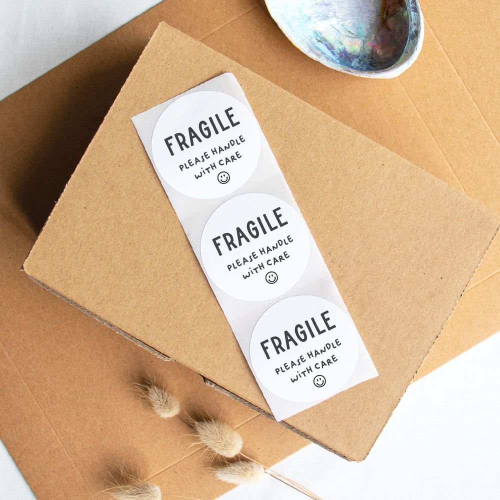 Fragile handle with care packaging sticker white - At The Helm NZ