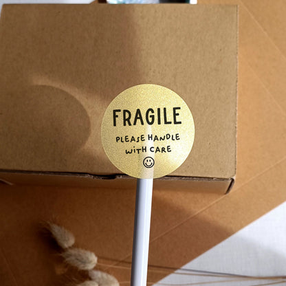 Fragile handle with care packaging sticker gold - At The Helm NZ